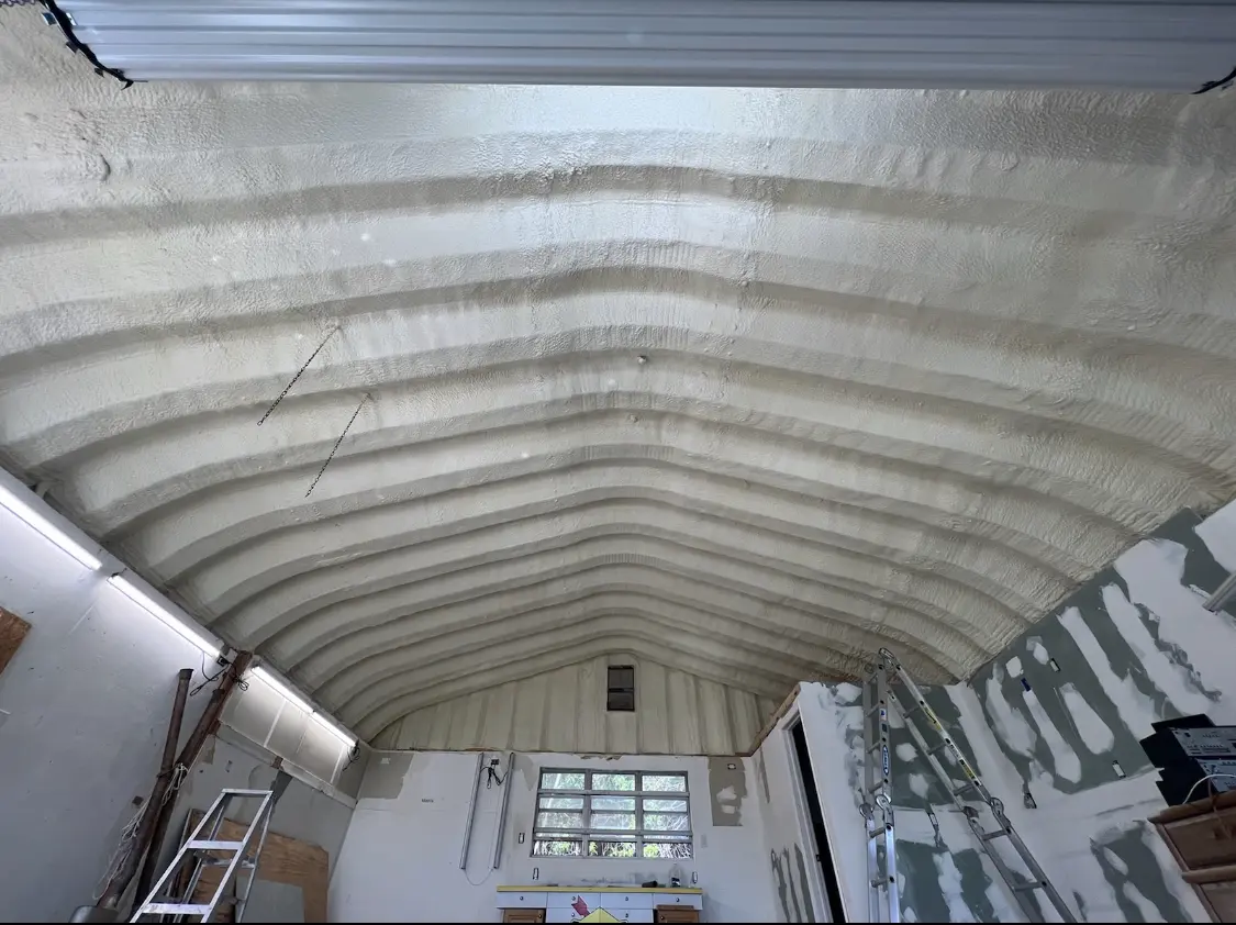 Spray polyurethane foam applied to the underside of a metal roof deck in Los Osos